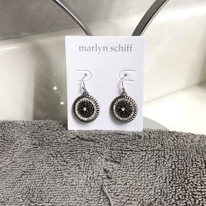 Black silver and stones. Brand New, never worn